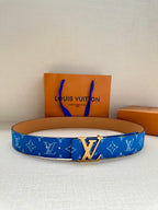 Louis Vuitton belt, blue monogram strap, tan edges, silver LV buckle