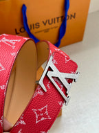 Louis Vuitton red monogram belt with silver-toned LV buckle and tan lining