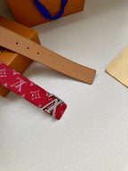 Louis Vuitton reversible belt: tan leather strap with belt holes and red monogram band
