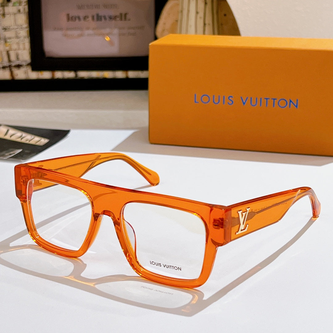 Louis Vuitton eyeglasses with amber orange frames and LV logo on temple, clear lenses