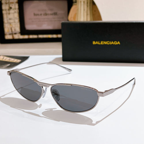 Oval dark gray tinted sunglasses with silver metal frame and slim arms