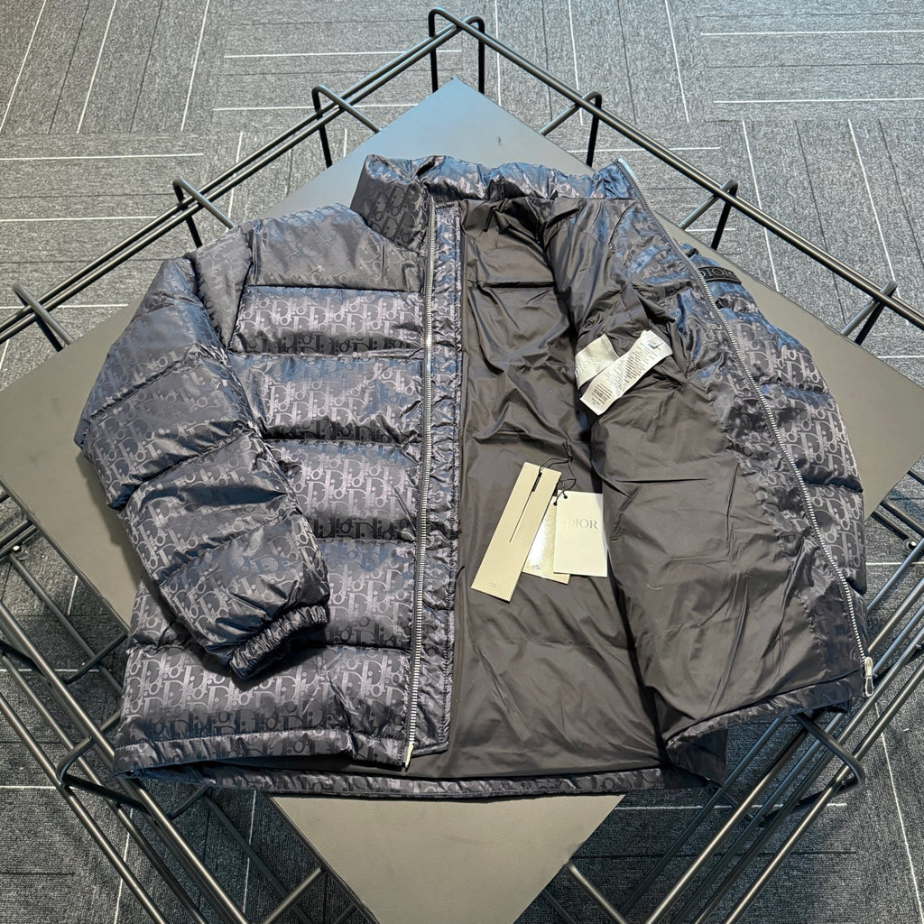 Dior long puffer jacket, quilted logo pattern, front zip and stand collar detail.