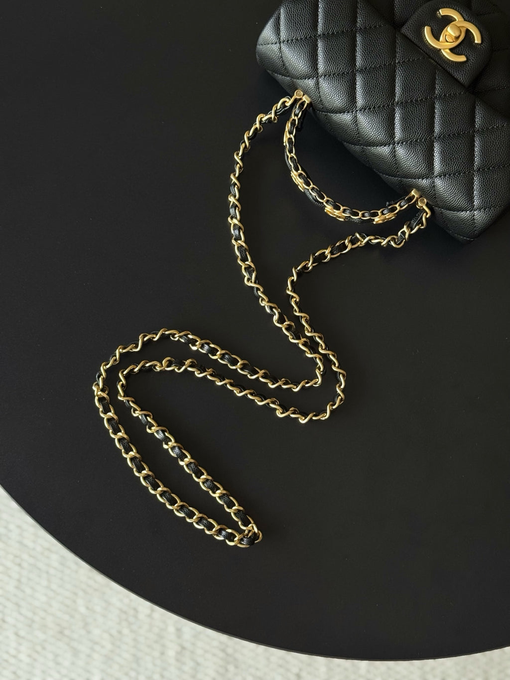 Chanel quilted mini handbag with chain strap and CC logo, black leather