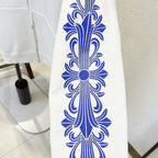 White hoodie sleeve with large blue floral line-art graphic