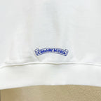 White hoodie hem logo patch with blue embroidered text