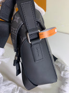 Louis Vuitton monogram bag with leather side strap and metal buckle hardware