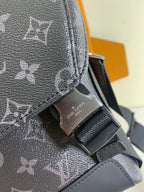 Louis Vuitton monogram crossbody bag close-up of strap buckle on textured leather