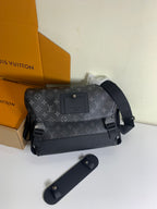 Louis Vuitton monogram shoulder bag with flap, adjustable shoulder strap, and front clasp