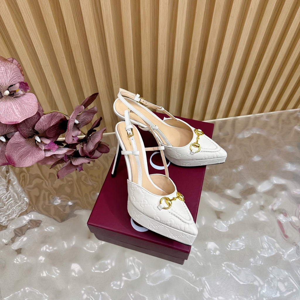 Gucci women's white high-heel pumps with gold horsebit buckle and thin ankle straps