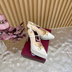 Gucci women's white high-heel pumps with gold horsebit buckle and thin ankle straps