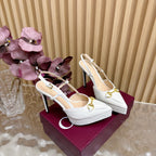 Gucci women's white stiletto heels with gold horsebit hardware and ankle strap
