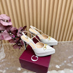 Gucci women's white high-heel pumps with gold horsebit detail and ankle strap