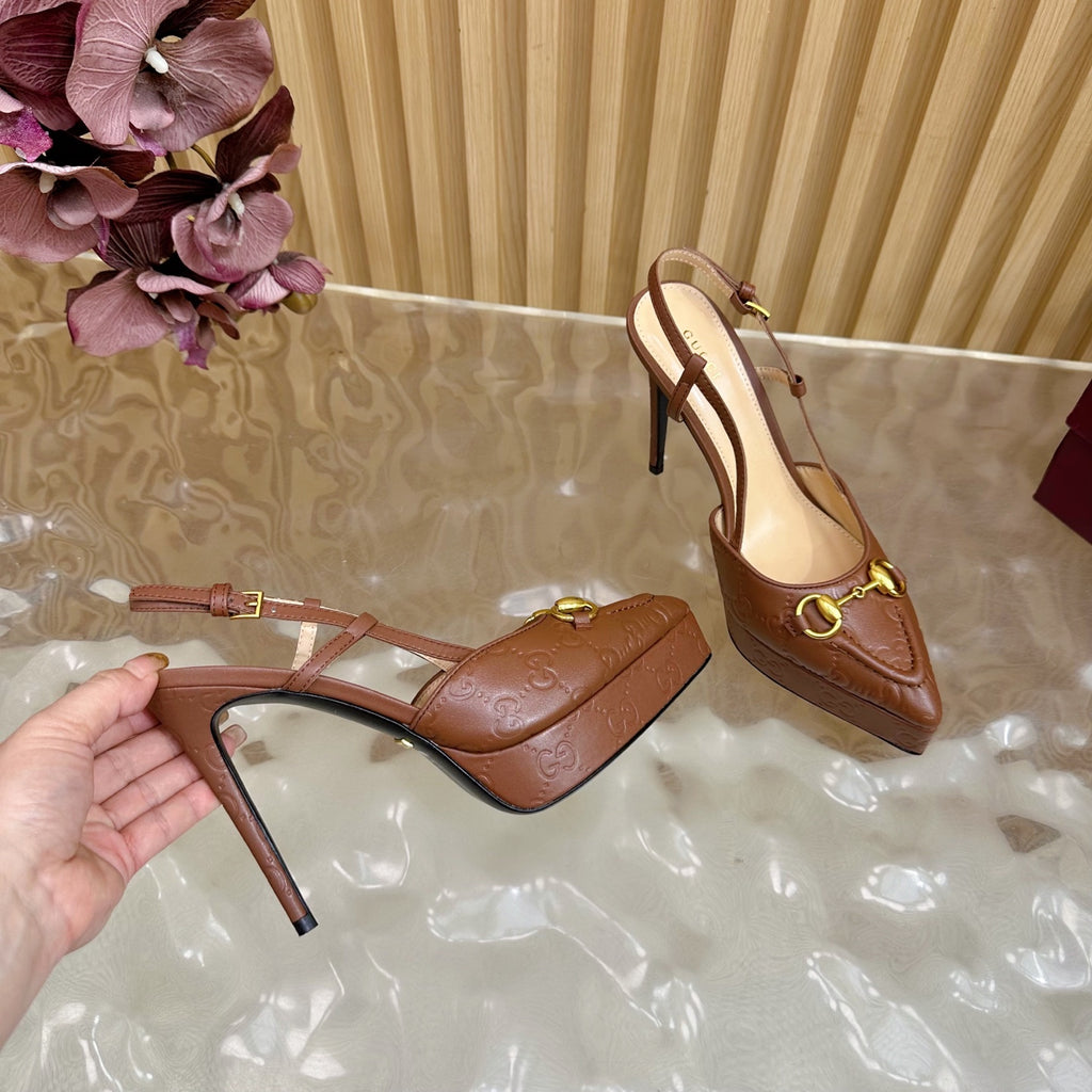 Brown Gucci slingback heeled mule with thin stiletto heel and gold ring buckle