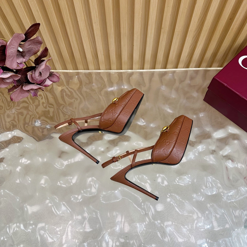 Brown Gucci slingback heeled mules with thin stiletto heel, sling straps, gold buckles