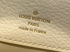 Louis Vuitton Paris made in France stamp on white leather bag