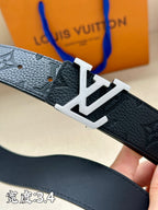 Dark blue grained leather belt with silver-tone LV buckle close-up