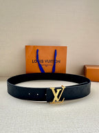 Louis Vuitton embossed leather belt, dark blue with gold LV buckle