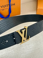 Leather belt with embossed pattern and gold-toned LV buckle detail