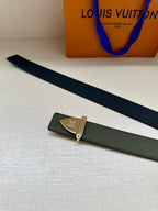 Green leather belt strap with small cream-and-gold buckle and holes
