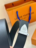 Louis Vuitton belt with dark blue leather strap and silver-tone buckle