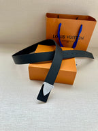 Louis Vuitton belt with dark blue leather strap, silver-tone buckle, and belt end