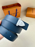 Blue leather belt with silver buckle and LV monogram plate, strap shows holes