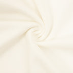 Cream sweatshirt fabric close-up with soft knit texture