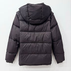 Long dark puffer jacket with hood, quilted back, elastic cuffs and full zip front