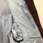 White puffer jacket lining with zipper tape detail and stitched seams