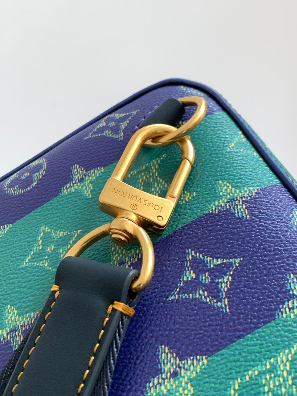 Louis Vuitton multicolor monogram bag with gold padlock clasp and blue key charm