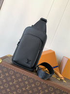 Louis Vuitton dark blue leather crossbody bag with adjustable strap and top handle