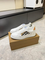 White Burberry check lace-up sneakers on display with textured sole