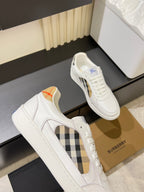 White Burberry check lace-up sneakers with tan and blue accents