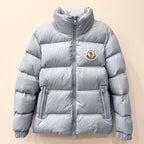 Light blue long puffer jacket with full-zip front and stand collar