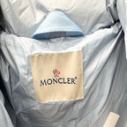 Light blue puffer jacket lining with Moncler brand label