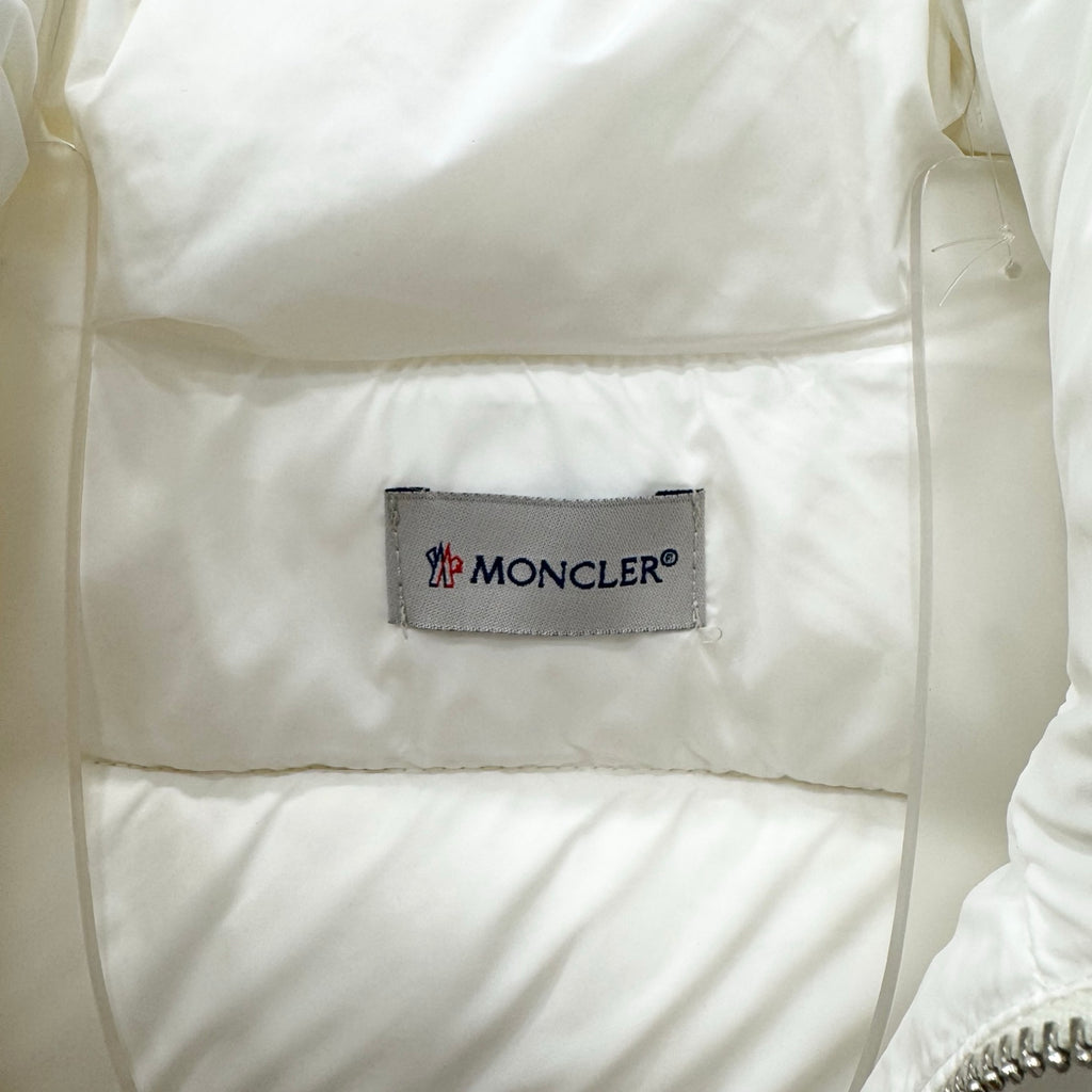 White puffer jacket interior with Moncler logo brand label