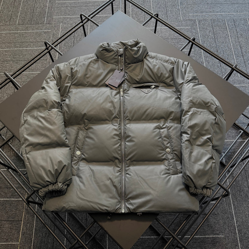 Prada long puffer jacket, olive outer, hood, front zip, ribbed sleeve cuffs