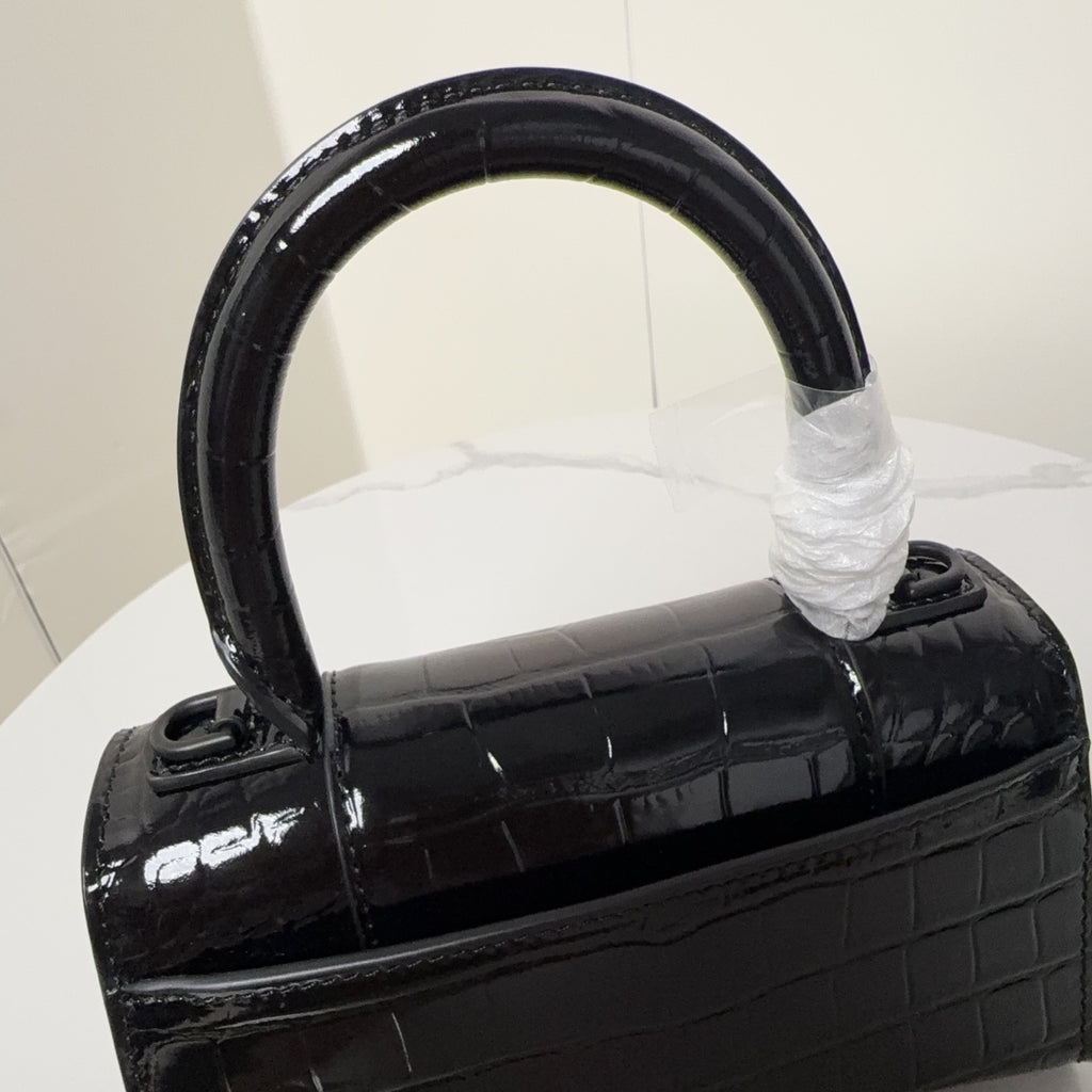 Black glossy croc-texture top handle with B hardware on front flap