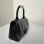 Dark gray croc-texture handbag with top handle and embossed B clasp