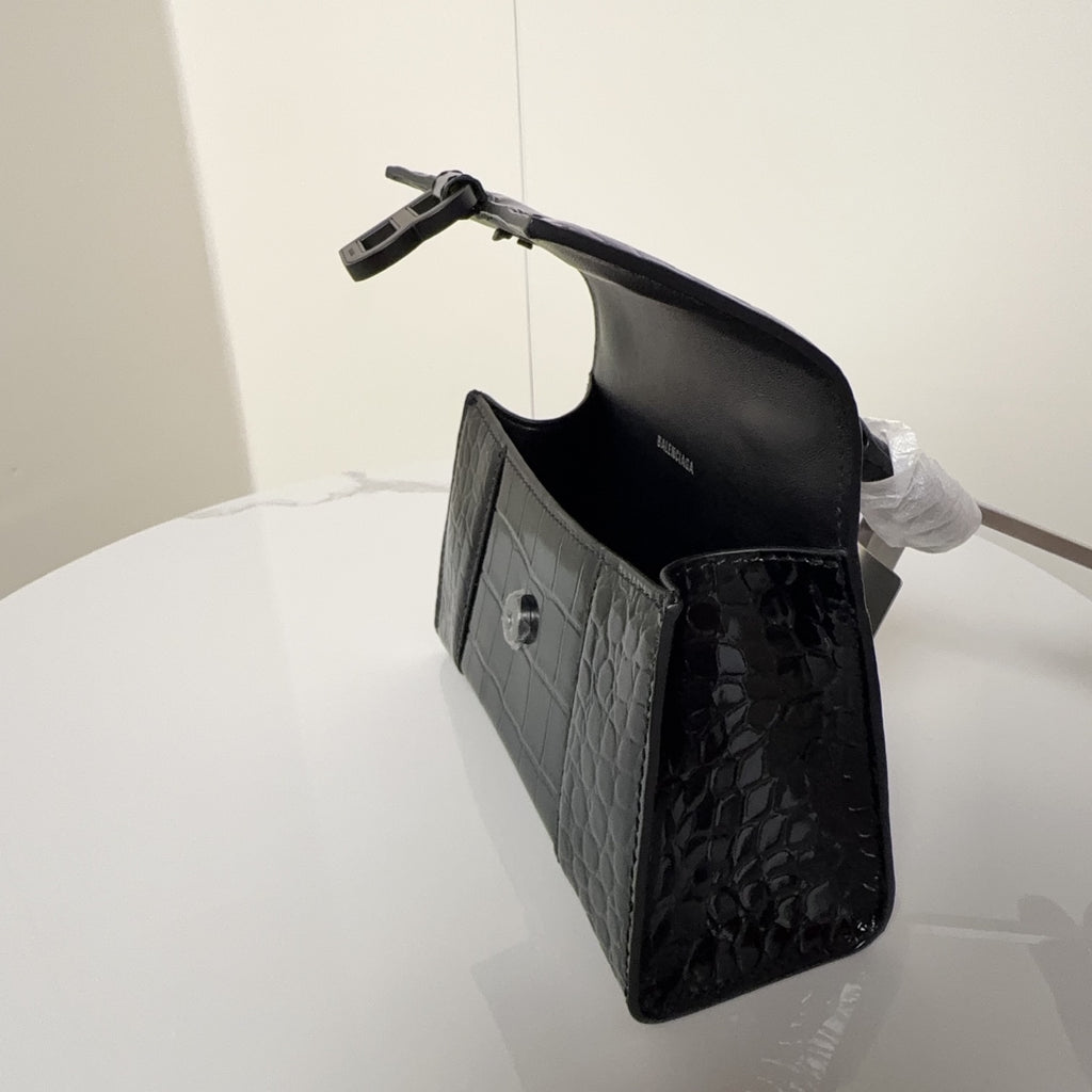Light gray croc-texture handbag with side pocket and black bottom panel