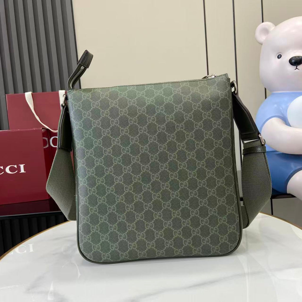 Gucci GG canvas shoulder bag with front zip pocket and top handle