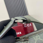 Gucci bag strap and zipper pull, green leather with metal hardware and logo plaque