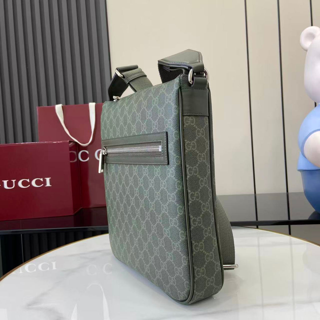 Gucci GG canvas shoulder bag angled view with front flap and zip pocket