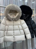 Moncler long puffer jacket with cream fur hood and zip front, side zip pockets