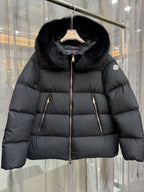 Moncler long puffer jacket with black fur-trim hood and central zipper