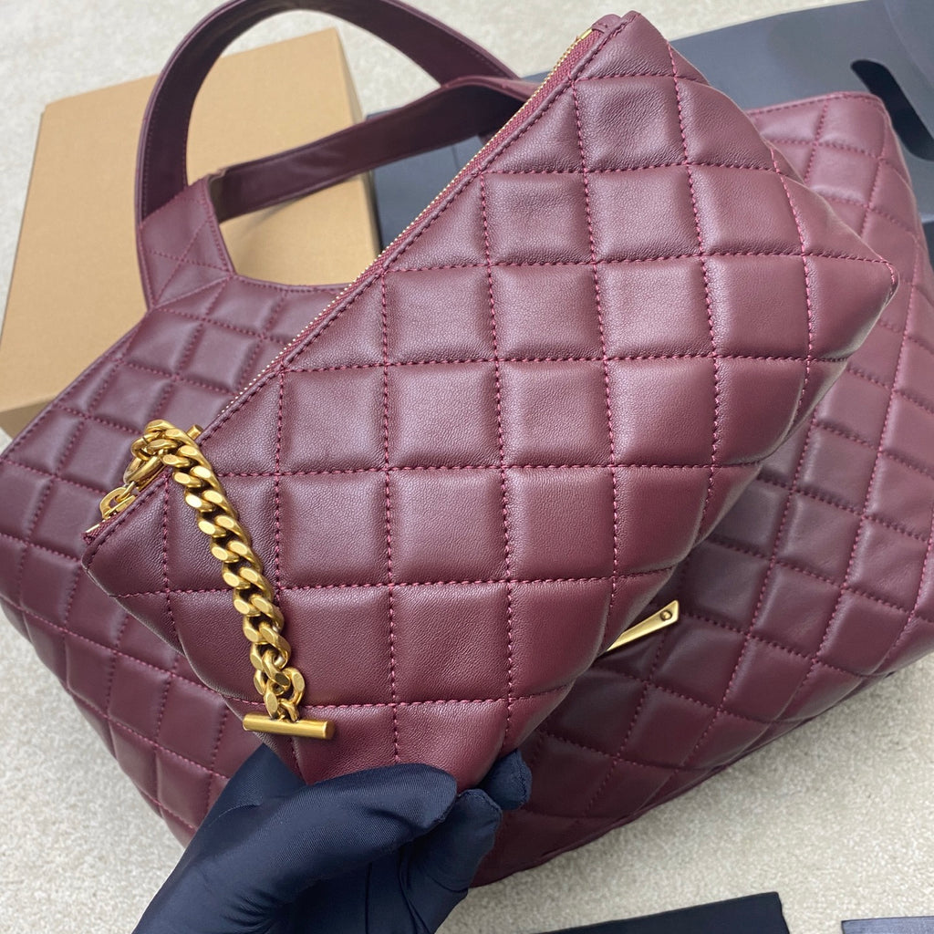 Quilted maroon handbag with gold chain strap and interior pocket detail