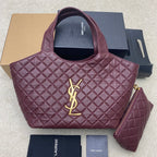 Quilted maroon handbag with YSL logo on front and coordinating shoulder bag strap
