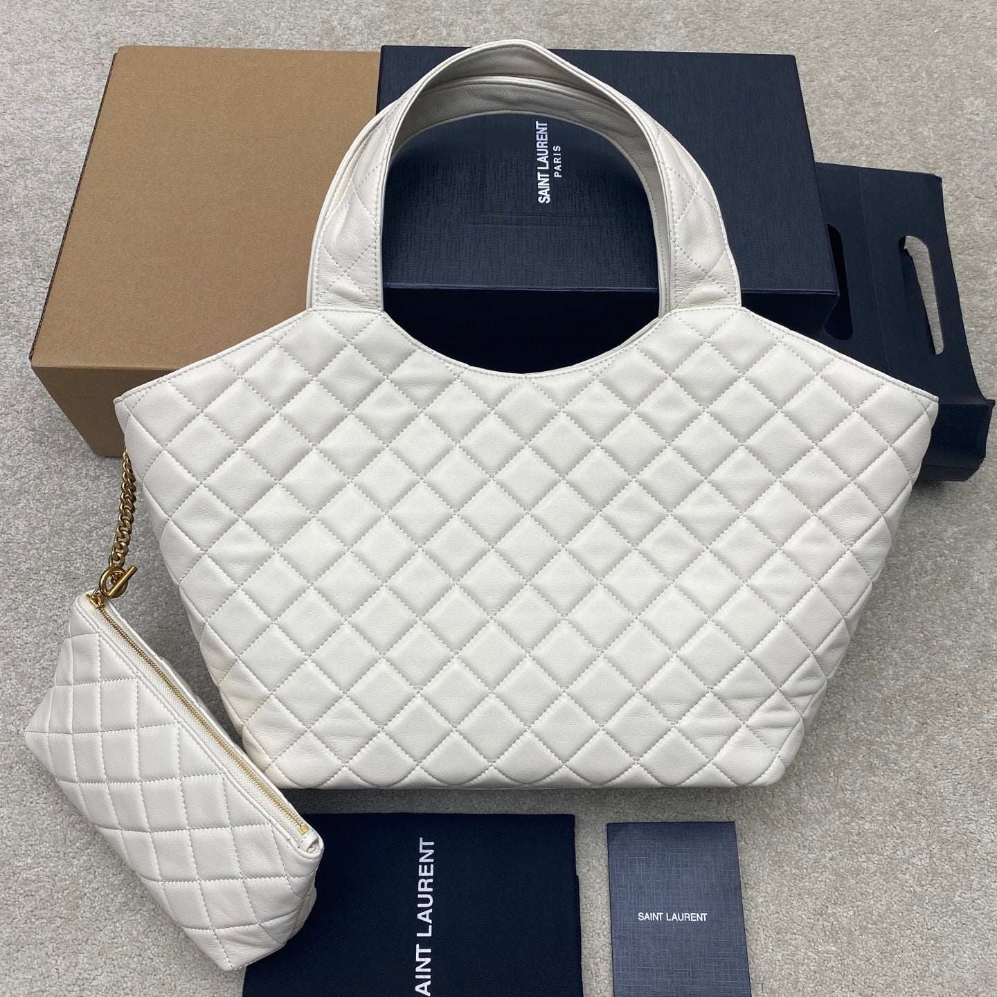 YSL white quilted tote with gold chain strap and matching small pouch
