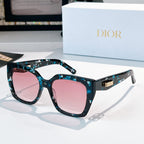 DIOR sunglasses with blue patterned square frames and pink tinted lenses