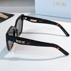 DIOR sunglasses side view with tortoiseshell temple and dark tinted lenses